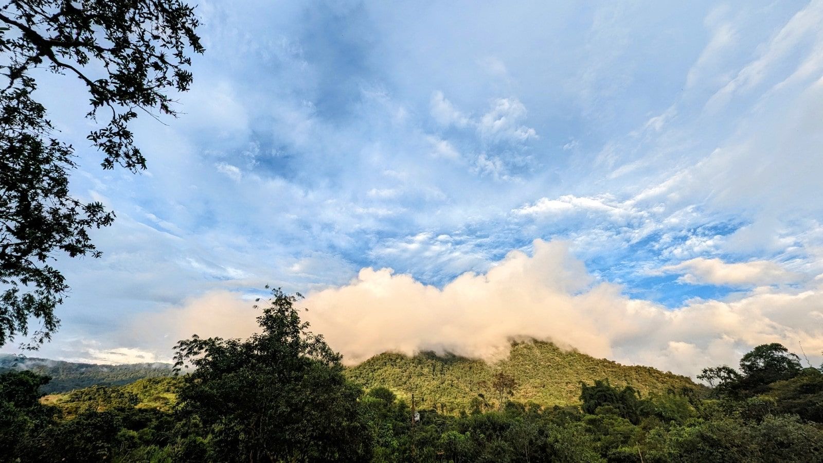 Low clouds drifting over the forested hills of Mindo Cloud Forest, Chocó Andino, Ecuador